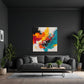 Abstraktes Wandbild in Orange und Türkis über einem Sofa im Wohnraum