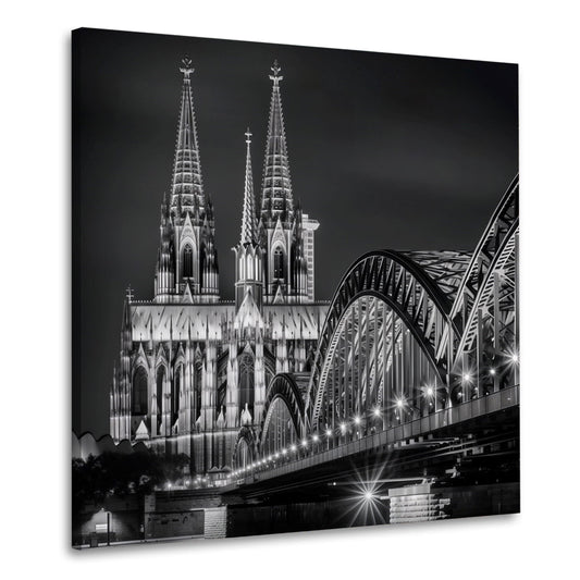 Kölner Dom mit leuchtender Brücke in Schwarz-Weiß Wandbild